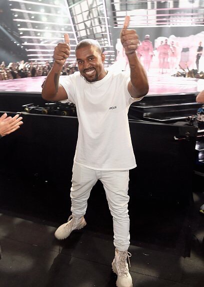 kanye giving thumbs up