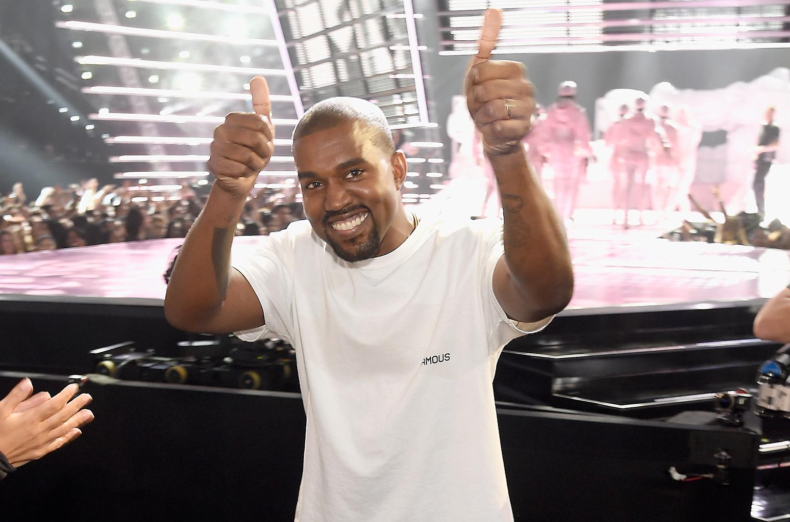 kanye giving thumbs up