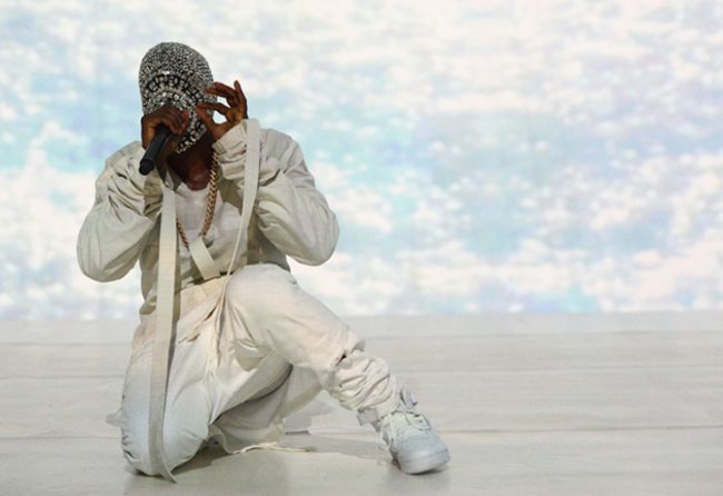 kanye singing with mask on
